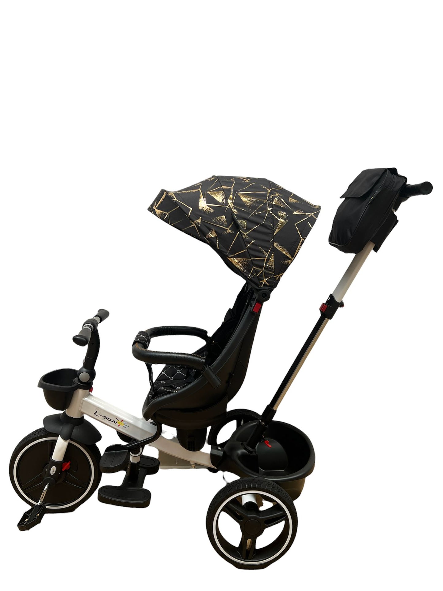 Triciclo plegable, asiento reversible, color negro y dorado.