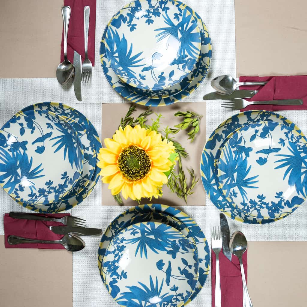Set de cină pentru 4 persoane, cu farfurie adâncă, rotundă, fildeș lucios, decorată cu frunze albastre